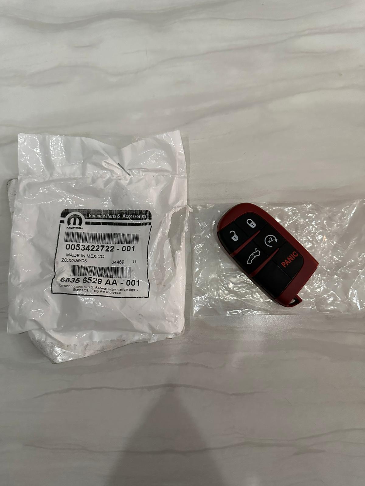 BRAND NEW OEM DODGE DEMON KEY FOB WITH UNCUT BLADE